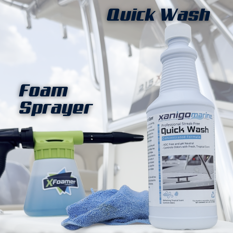 Foam sprayer and bottle of xanigo marine Quick Wash with a blue towel on a boat deck.